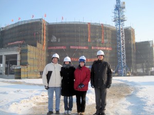 Karen Nielsen and Pamela Ruegg of the UW-Madison visited the construction site of the Dairy Farming Institute in Shuangcheng, China in January. with Nestle's construction supervisor (at left) and Nestle executive Robert Erhard.