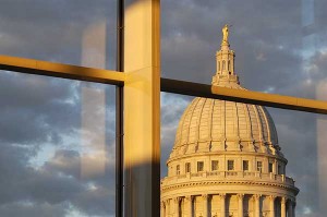 View of the Wisconsin State Capitol Building dome at sunset, as seen from the large glass lobby of the Overture Center for the Arts in downtown Madison, WI. ©UW-Madison University Communications 608/262-0067 Photo by: Jeff Miller Date: 08/04 File#: D100 digital camera frame 6699