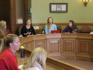 LSC senior Danielle Voellinger asks a question about how avian flu will affect Wisconsin’s economy during the press conference.