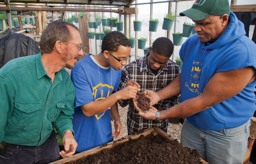 Steve Ventura (far left), leader of the Diversifying Wisconsin’s Food and Agriculture Industry initiative, with PEOPLE program graduates and Will Allen of Milwaukee's Growing Power.