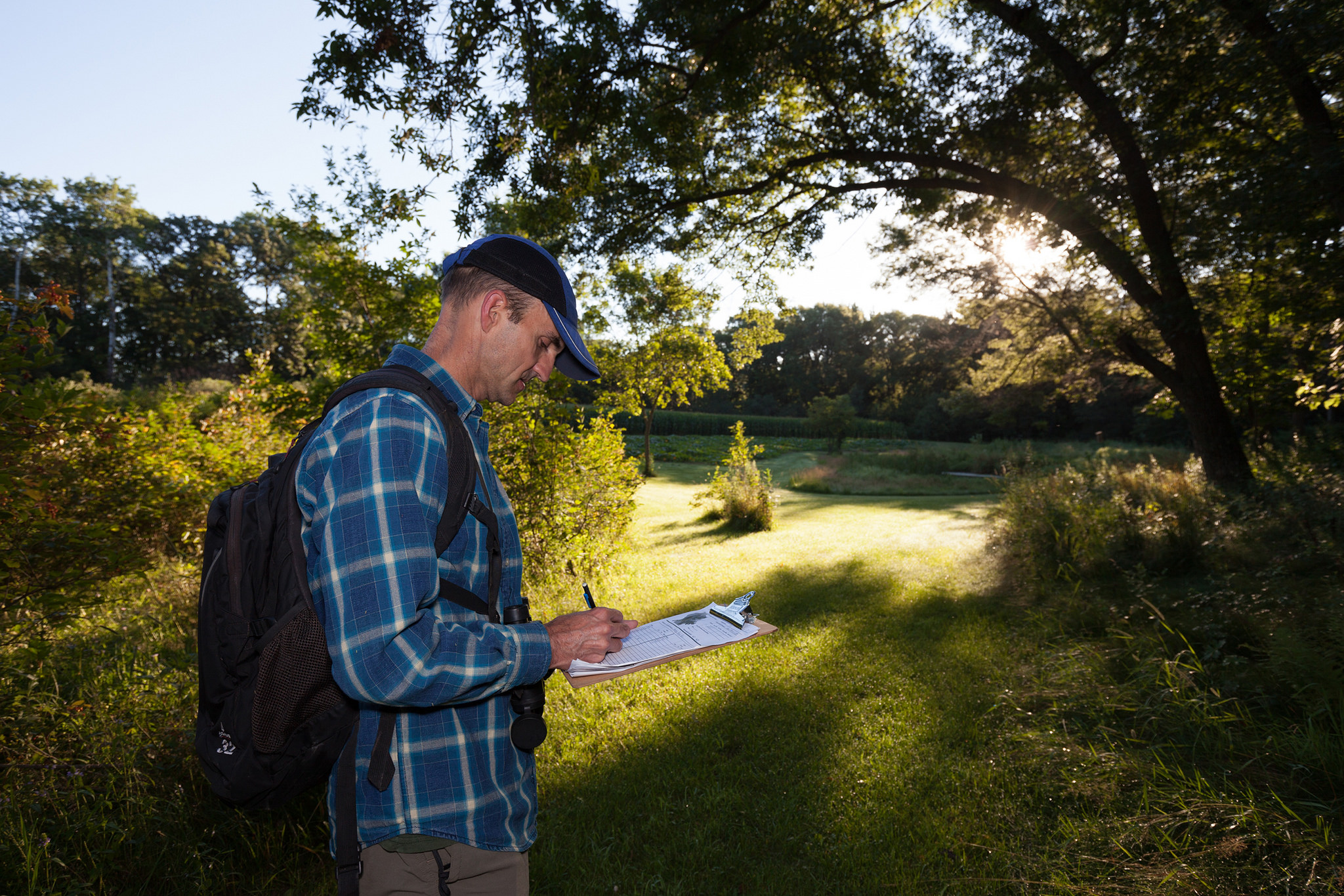 Jim Berkelman out birding on behalf of the Atlas. Photos by Wolfgang Hoffmann.