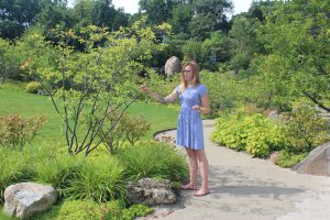 Landscape architecture graduate student Lily Mank, pictured here on the Rosecrance campus in Rockford, is exploring how gardens help people heal.