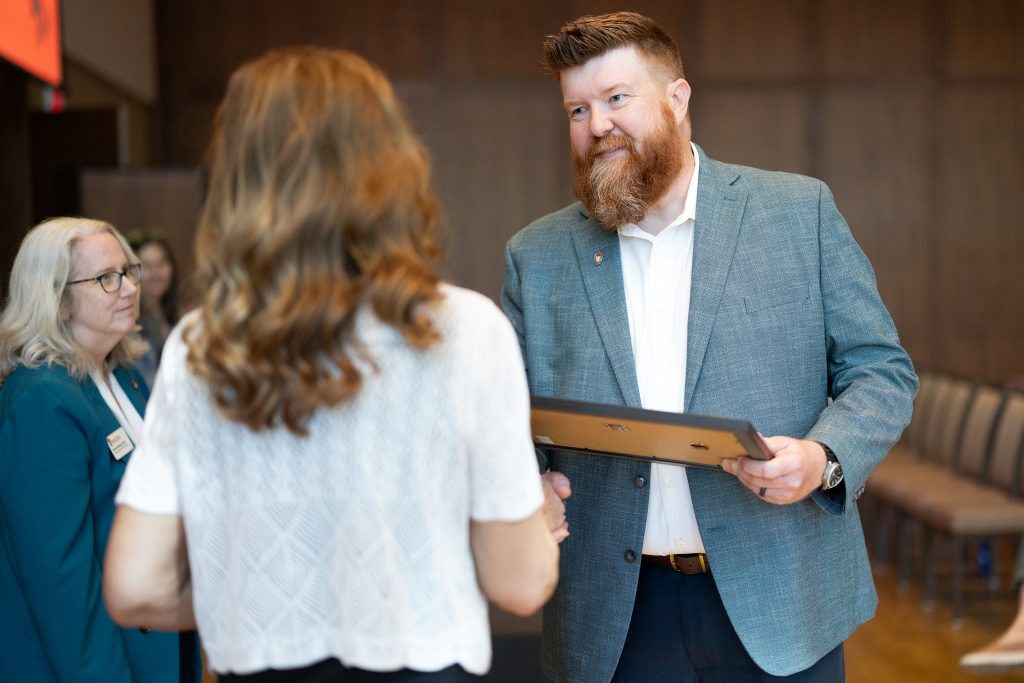 Man accepting award